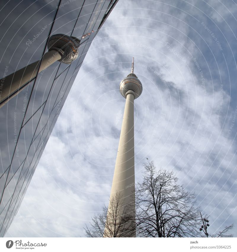 Television tower Berlin with reflection at Alexanderplatz Sky Clouds Beautiful weather Town Capital city Downtown Tower Facade Window Tourist Attraction