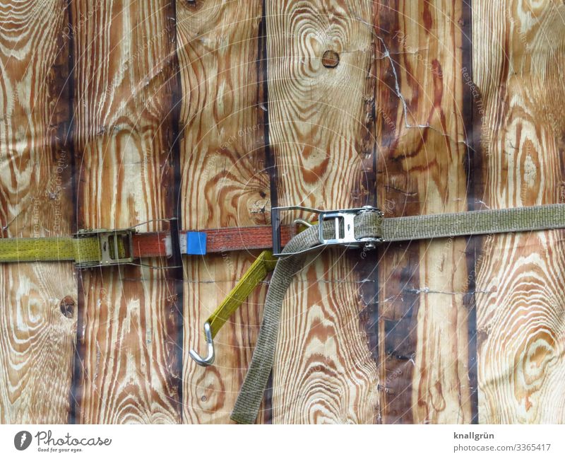 coherence lashing strap Brown Green Silver Wood look wood decor Colour photo Exterior shot Deserted Copy Space top Copy Space bottom