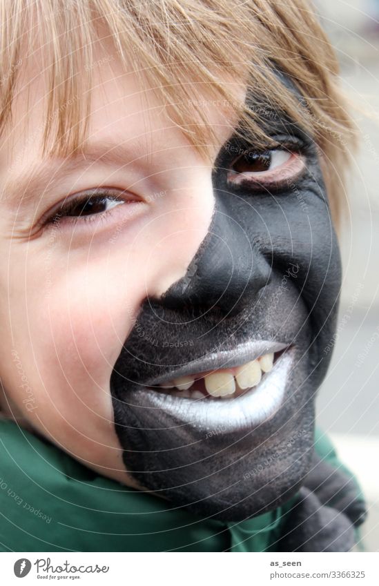 ;-) Carnival Hallowe'en Birthday Boy (child) Infancy Face 8 - 13 years Child Youth culture Blonde Smiling Laughter Looking Authentic Happiness Positive Green