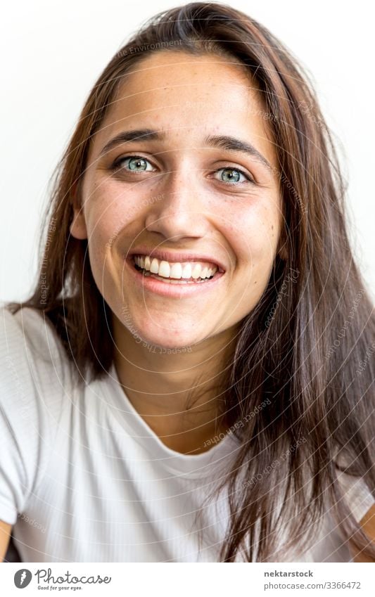 Portrait of Young Middle Eastern Woman with a Big Smile female girl woman young adult portrait smile toothy smile happiness looking at camera close up day