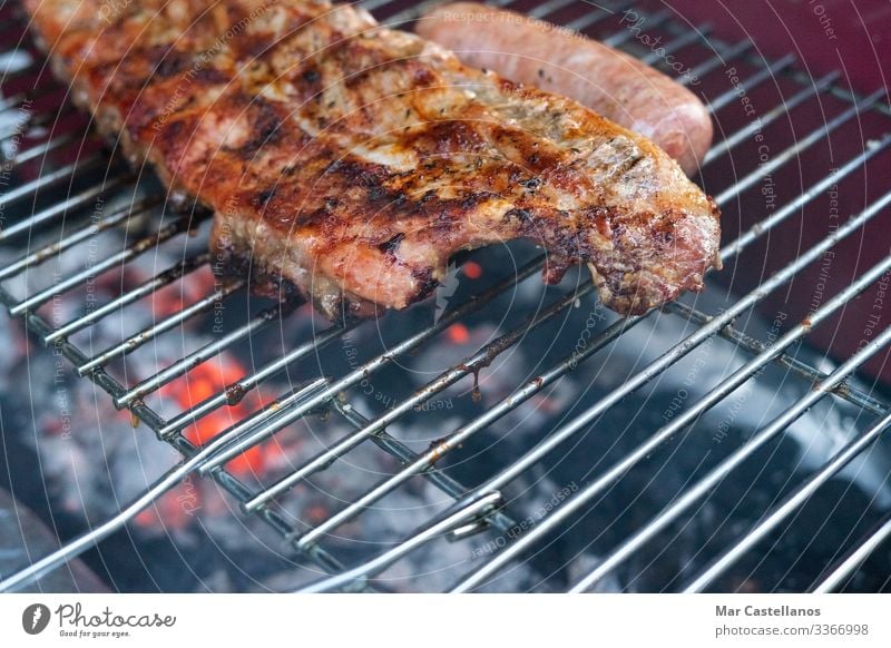 Pulling pork ribs grilled over the coals. Concept of food. Meat Eating House (Residential Structure) Garden Restaurant Feasts & Celebrations Human being