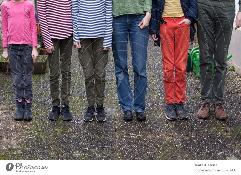 family constellation people group Legs Stand to attention colored variegated Funny in common variation Multicoloured Exterior shot Leisure and hobbies free time