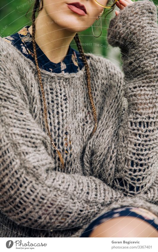 Young woman in knitted dress in the park Lifestyle Style Beautiful Face Summer Human being Youth (Young adults) Woman Adults Lips 1 18 - 30 years Autumn Park