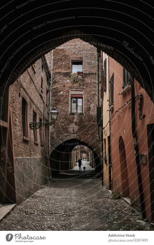 Arch opening passage to narrow street in city old arch house architecture travel stone building town traditional destination urban culture scene typical