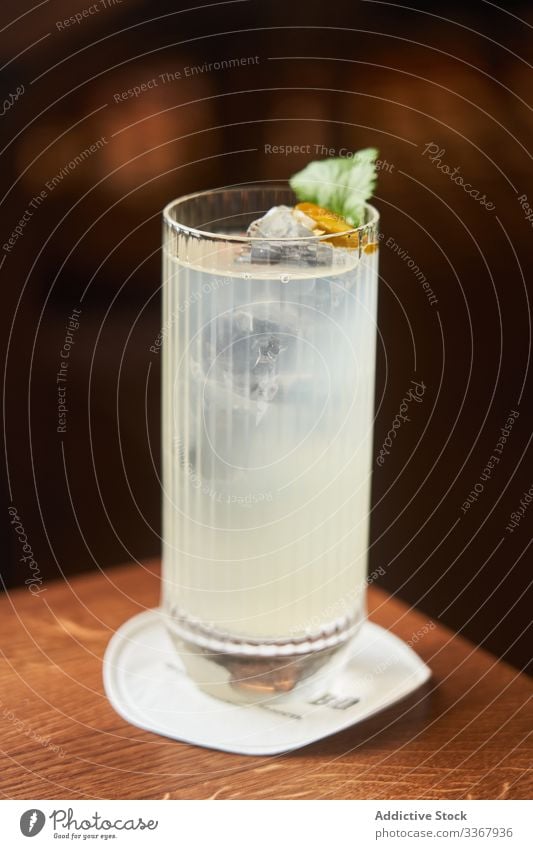 Glass of alcohol drink with tonic cocktail classic glass vodka gin highball beverage bar white luxury aperitif lemon traditional fresh liquid mixed citrus