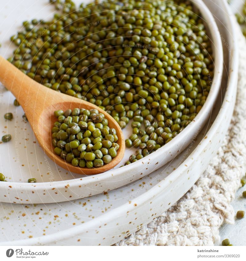 Dried mung beans on a plate with a spoon Vegetarian diet Diet Plate Table Green White Beans ceramic fiber food health healthy Ingredients Kidney legume