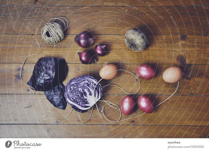 Ingredients Rustic Easter need Easter egg dyeing recipe Wooden floor String Onion Red beet red cabbage Egg boiled eggs colorful eggs Multicoloured