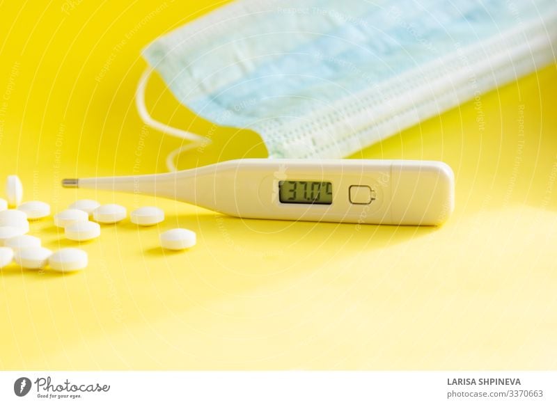 Thermometer, medical mask, pills, tablets on yellow Health care Medical treatment Illness Medication Winter Table Autumn Natural Yellow White medicine health