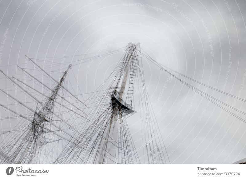 Ship in port on the Baltic Sea - masts and rigging ship ship's mast Rigging Sky Clouds Clouds in the sky Gray Dreary multiple exposure Colour photo