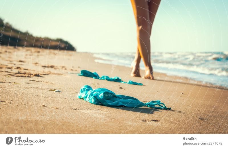 swimsuit in the sand on the beach near the sea surf Summer Beach Ocean Waves Young woman Youth (Young adults) Nature Sand Sky Horizon Warmth Coast Clothing Hot