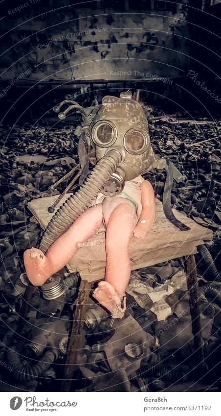 old doll in a gas mask in an abandoned house Chernobyl Ukraine Town Old Gloomy Dangerous Environmental pollution Destruction a doll in a gas mask a scary