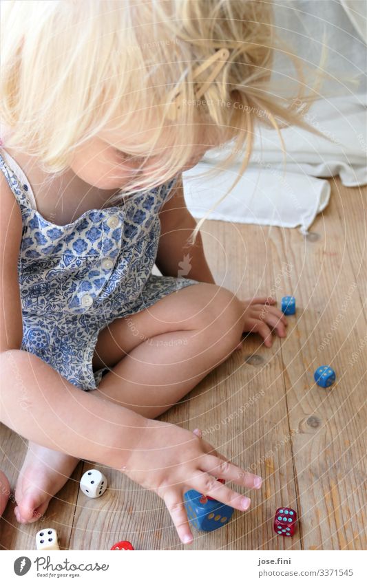 Dice game II Joy Healthy Playing Children's game Living room Feminine Toddler Girl Infancy Body Fingers Blonde Select Movement Sit Happy Curiosity Blue White