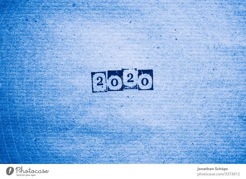 year 2020 on crafted paper Copy Space bottom Copy Space top Copy Space right Copy Space left Studio shot Predict Digits and numbers Simple Fear of the future