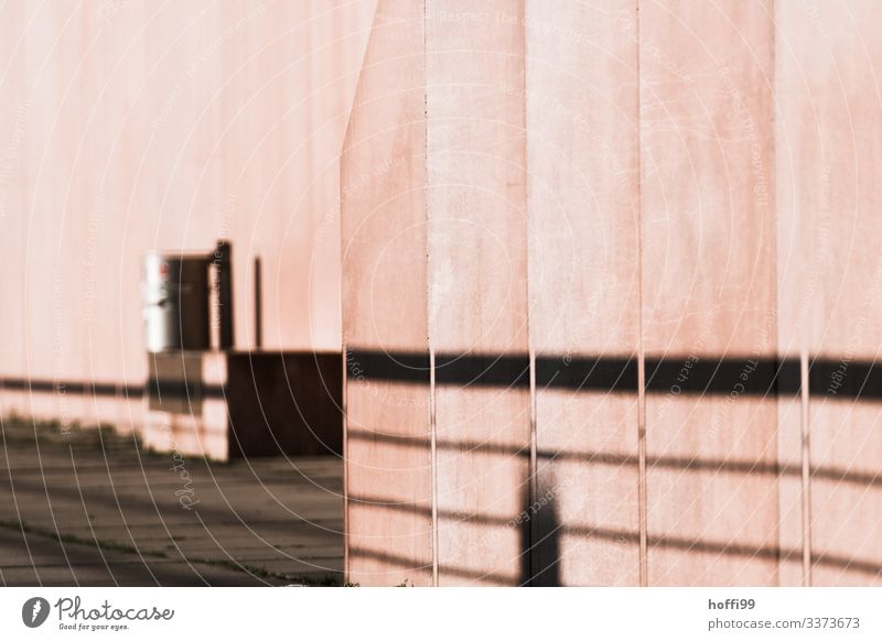 pink exposed concrete with shadow and trash can Concrete Facade Symmetry Concrete wall Stripe Art Surrealism Creativity Handrail Manmade structures Modern