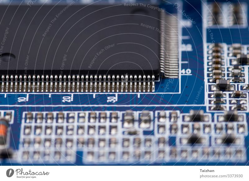 black microchip on on blue printed circuit board. Industry Computer Technology Internet Dark Blue Black Token Electronic integrated tech Technical Core cpu Data