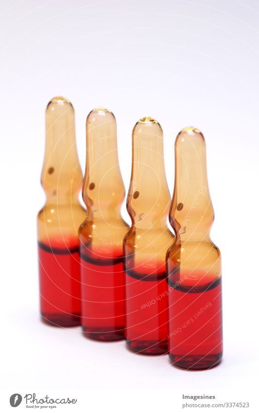 Serum B12, vitamin C in ampoules for medical treatment. brown bottles of medicine or vaccines, vitamin Concepts of health, medical care, vaccination, horizontal perspective