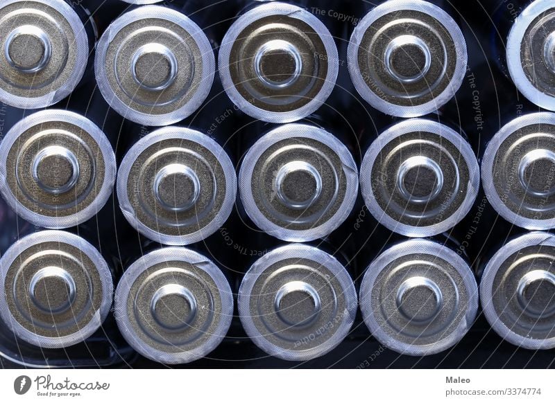 Several new alkaline batteries in one size in rows Battery Alkaloid Raw materials and fuels Energy industry Electricity Electronics Isolated (Position) Cargo