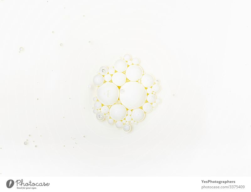 Milk surface with oil bubbles. Milk bubbles in oil Personal hygiene Fluid White Pure above view background Beauty Photography blobs Air bubble bubbly