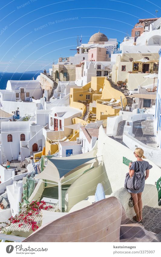 Oia village at sunset, Santorini island, Greece. Beautiful Vacation & Travel Tourism Summer Ocean Island House (Residential Structure) Woman Adults Culture