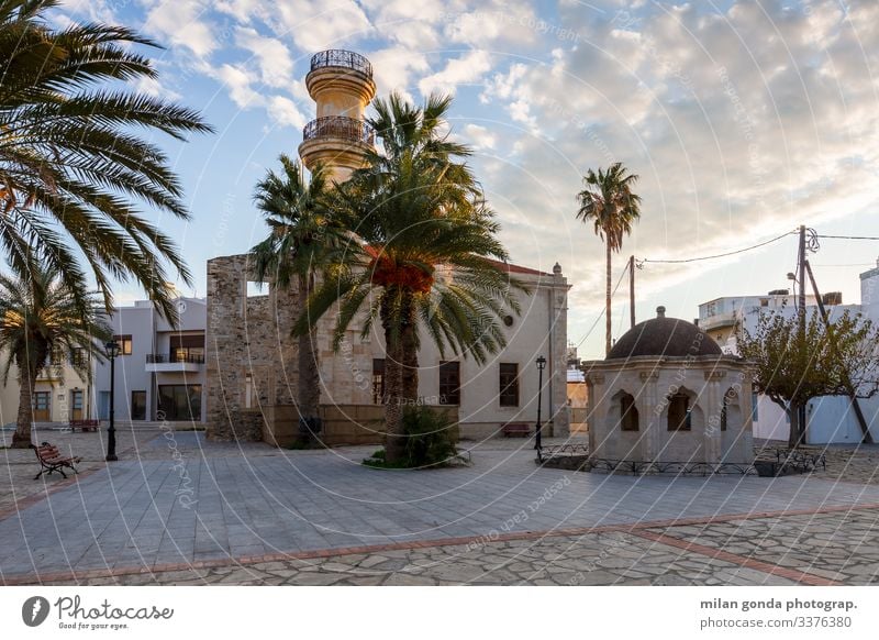 Mosque in Ierapetra, Crete. Europe Mediterranean Greece Greek Lasithi town square street cityscape architecture fountain palm trees palms mosque Ottoman Minares