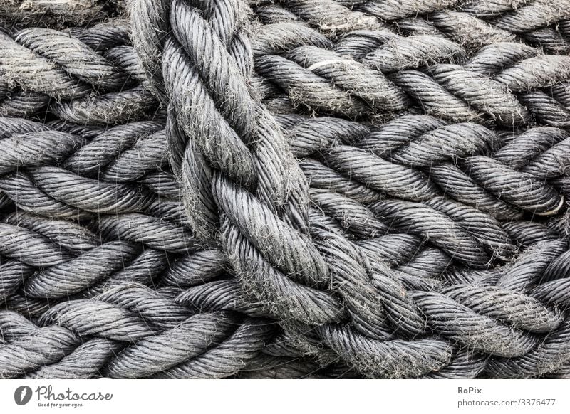 Close up of mooring ropes. background stack pattern texture white abstract detail boat industrial marine nautical knot cord hemp spiral string cable sea line