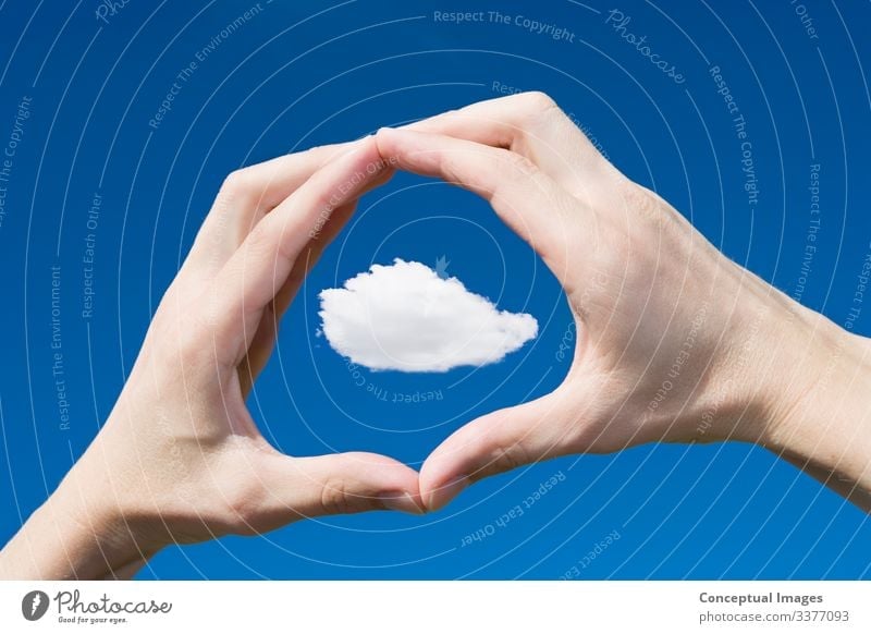 Man framing a cloud in his hands Clouds Idea Creativity Focus Human hand Personal perspective Scale Scrutiny point of view freedom gesturing concept ideas blue