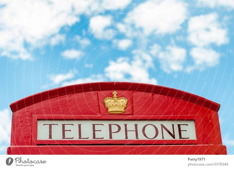 English phone booth and a piece of heaven Telephone Phone box Sky England Bright Blue Red Communicate Nostalgia Tourism Colour photo Exterior shot Detail