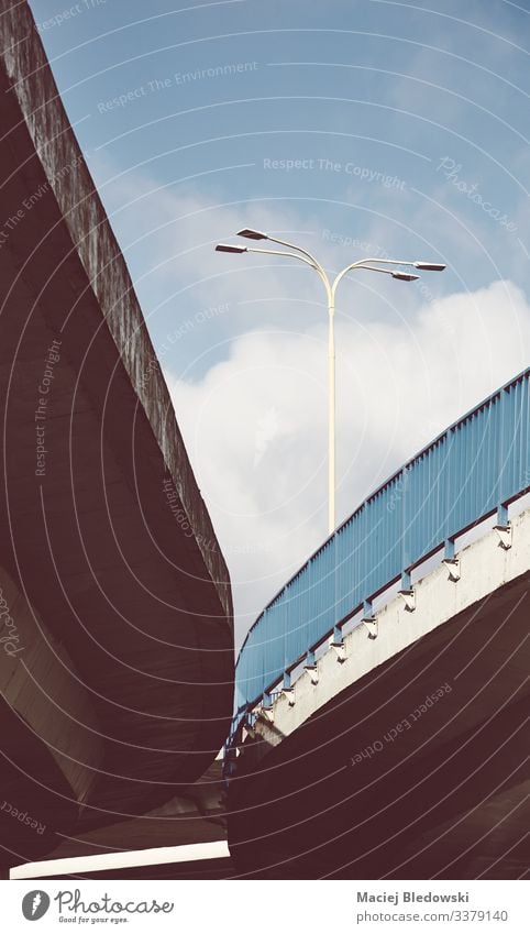 Overpass with crash barrier, color toned picture. road overpass concrete city minimalist lamp infrastructure instagram effect filtered vintage sky urban faded