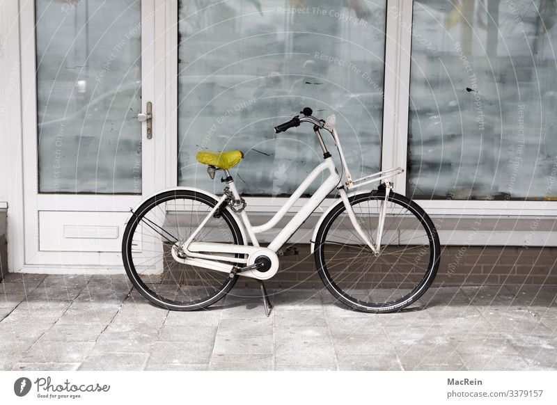 White bike Means of transport Bicycle Stagnating Lose Target Shop window Deserted Copy Space Exterior shot Colour photo Day