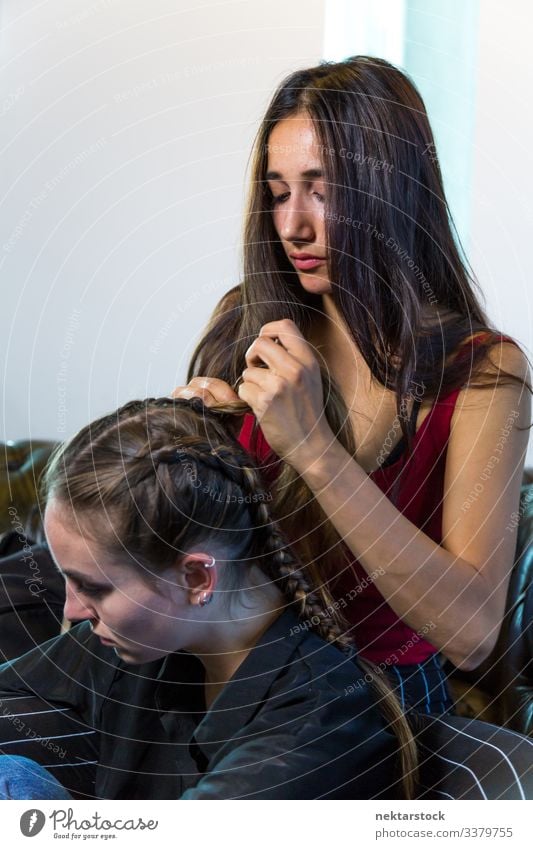 Girlfriends Braiding Hair female girl woman young adult youth culture day female beauty natural beauty natural lighting Indian ethnicity 2 people