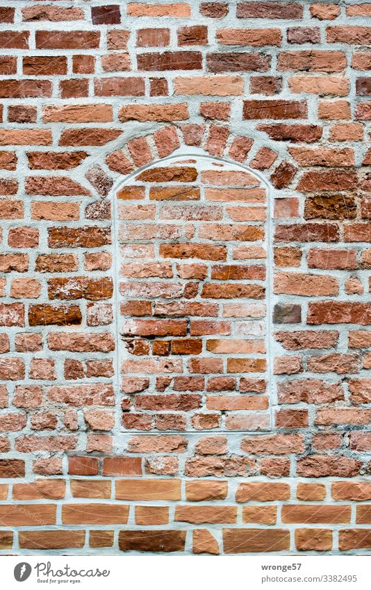 Brick wall with bricked up window opening Wall (barrier) brickwork walled up Wall (building) Exterior shot Colour photo Deserted Facade