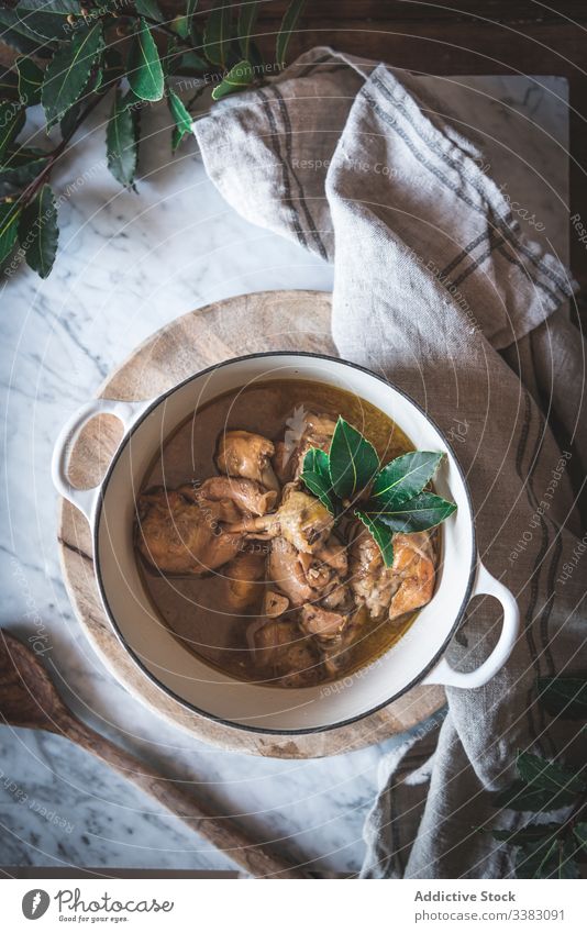 Aromatic soup with stewed chicken herb meal broth table cuisine tasty dinner fresh rustic bowl food delicious organic healthy composition leaf culinary