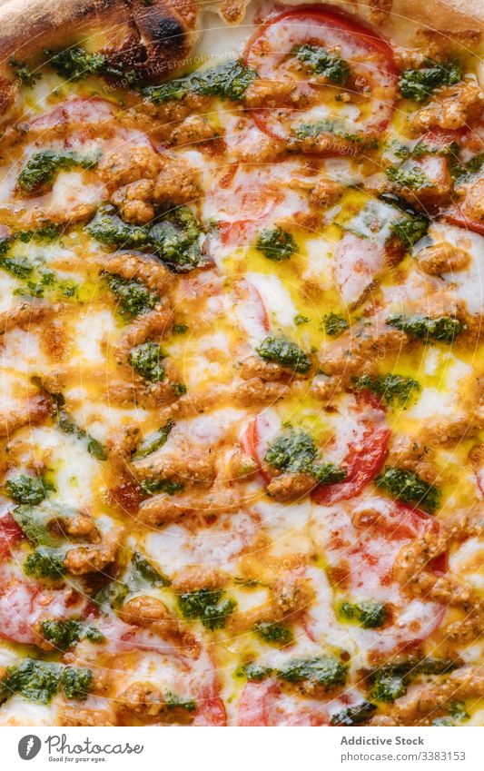 Fresh pizza with cheese and green pesto restaurant dish meal tasty tradition italian lunch delicious cuisine yummy fresh herb plate crust appetizing culinary