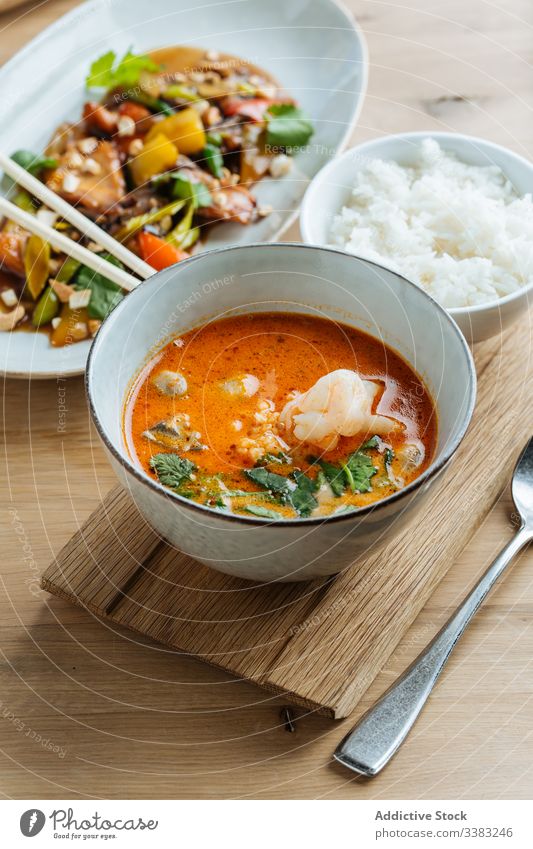 Healthy Asian dishes in restaurant asian food soup haute cuisine vegetables chopsticks rice tom yum seafood serve appetizing gourmet dinner delicious tasty meal
