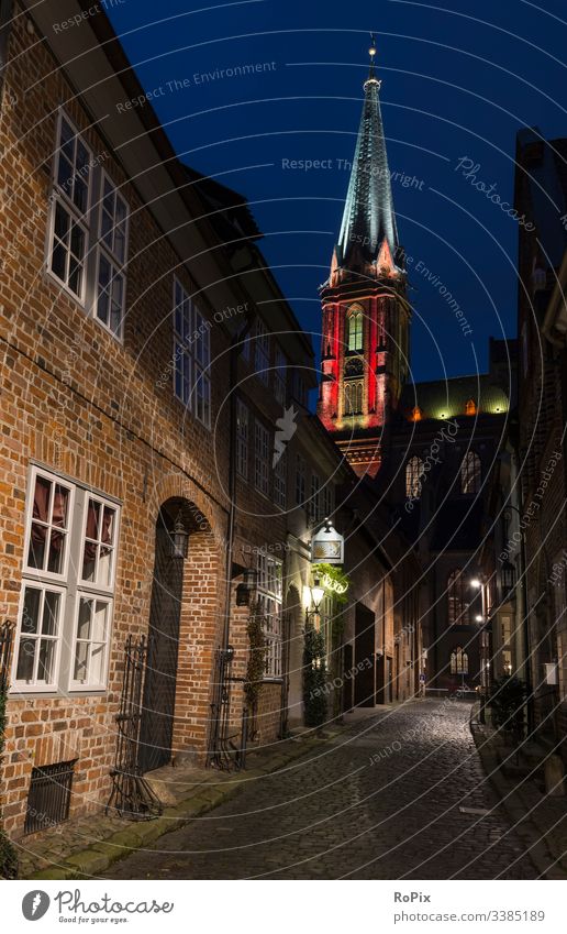 Historic church colorful illuminated. cathedral tower religion architecture glass window stained glass old outdoor religious catholic night building light