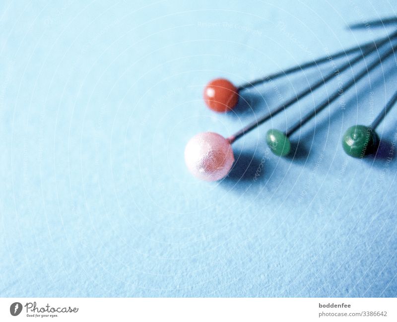 Push-in needles Little Pins and needles minimalism Colour Blue background Shadow