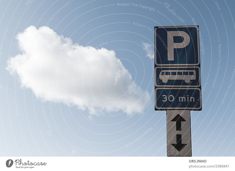 Parking sign for coaches with a cloud in the background parking sign Parking for coaches Arrow Sky Clouds parking management great focal depth Deserted Day