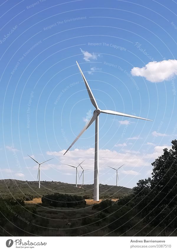Wind generators on the mountain with blue sky industrial environment powerful conserve concept clear scenic turbine rural supply windy blades electric