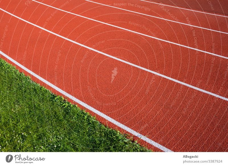 Running track lanes background for field athletics, all-weather red surface with white lines. abstract compete competition course exercise leisure olympic