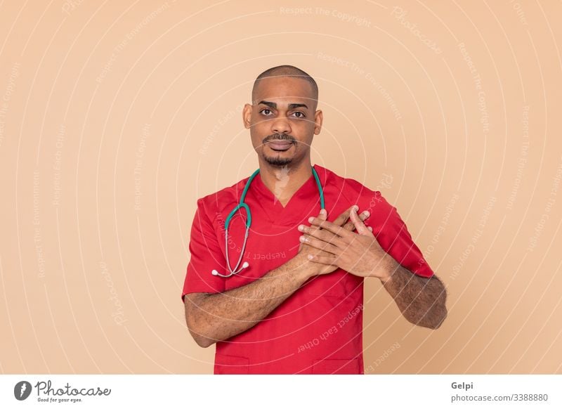 African doctor wid red uniform health in love lover heart cardiology cardiologist african review fall in love stethoscope medical person medicine care black