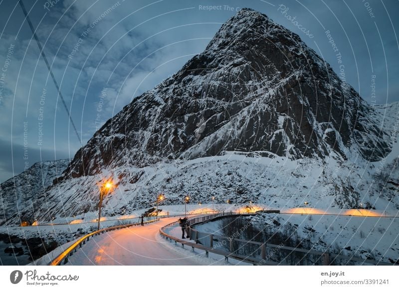 Snowy road in front of winter landscape on the Lofoten Vacation & Travel Trip Winter Winter vacation Environment Landscape Sky Clouds Bad weather Ice Frost