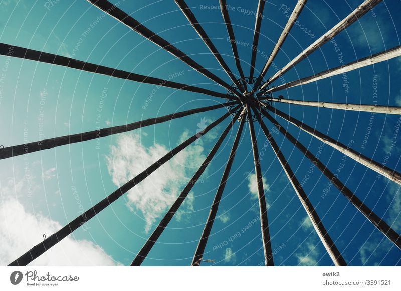 In a tepee Above Sky Clouds mast Aspire Tent Tee Pee Simple Exterior shot Colour photo Native Americans Silhouette Framework Joist Scaffolding out Sunlight
