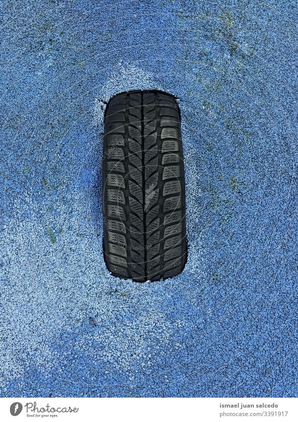 black tire on the blue ground land dirt dirty backgrounds textured Pattern Abstract Surface Rough Material Old abandoned