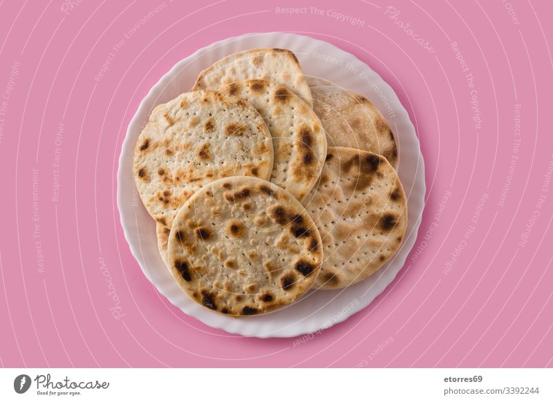 Handmade matzah for Jewish Passover on pink background baked bread celebration culture dough food handmade hebrew holiday homemade isolated israel jewish