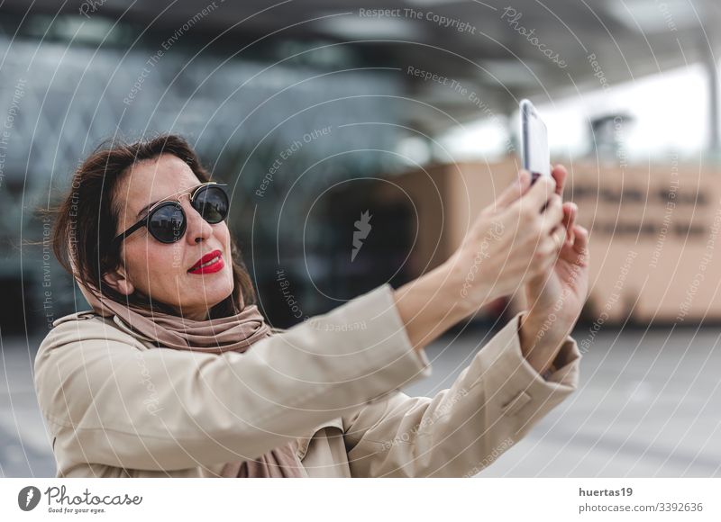 Arab woman with hijab Taking a selfie female attractive suitcase muslim muslim woman mobile phone arab baggage travel: islamic traveler arabian arabic trip