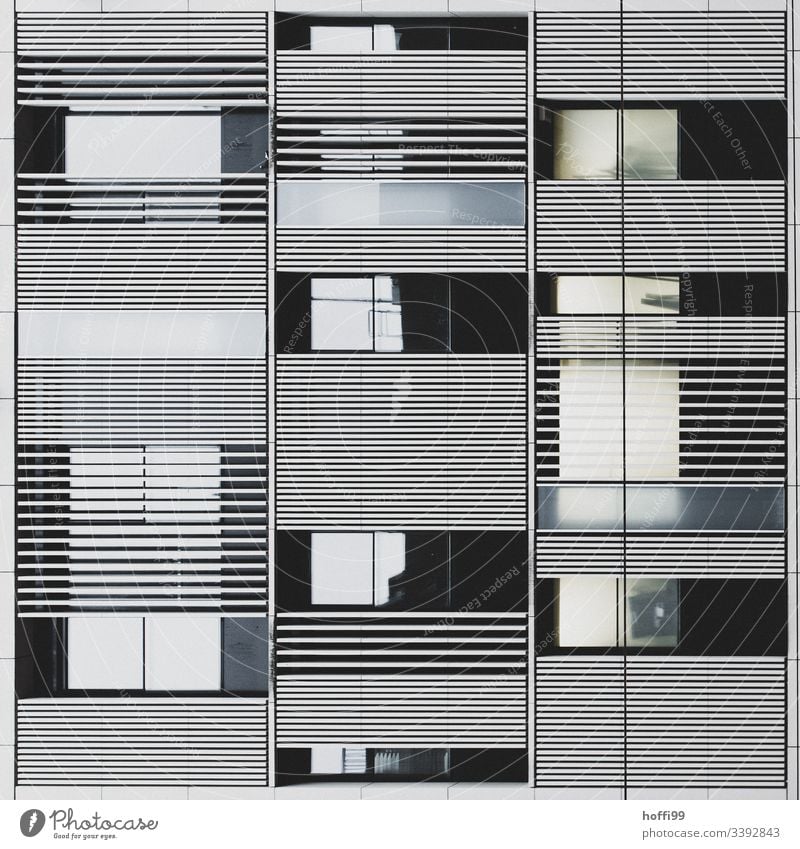 Abstract façade with reflective windows High-rise Bank building Window Facade Building Esthetic Symmetry Surrealism Light Stagnating Pure Financial Industry