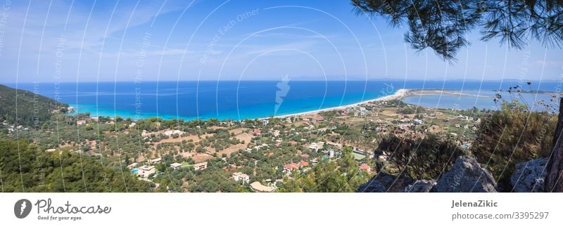 Agios Ioannis beach on Lefkada island landscape blue outdoor seascape nature clear beautiful sky scenic panorama background summer ocean horizon stones wave