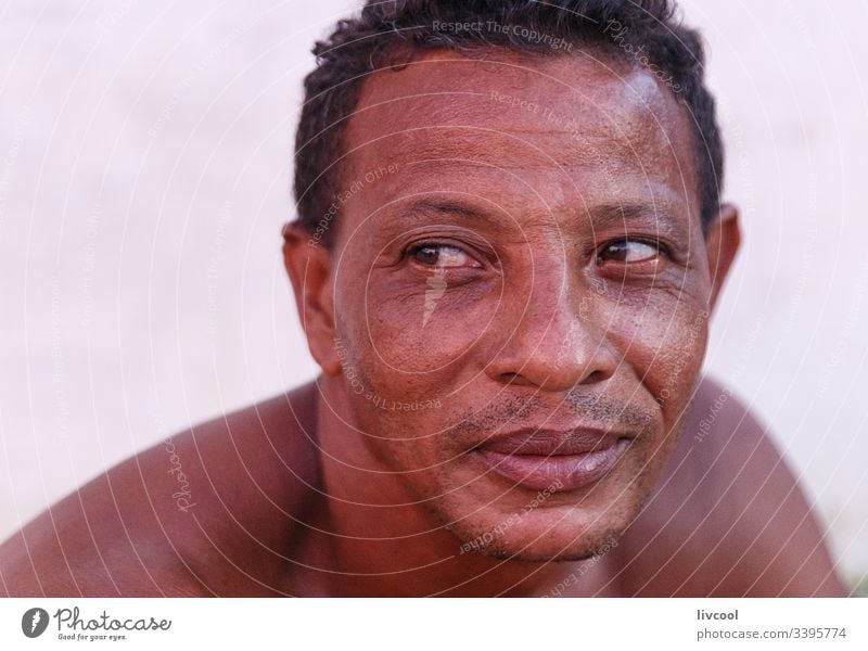 man resting II , trinidad cigar adult smile naked chest native cuban smoking adulthood cute leather skin people portrait caribbean island street lifestyle