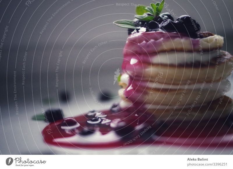 Pancakes with berries and sauce pancakes blueberries Berries Dessert Food photograph Desserts