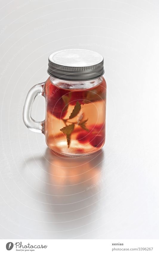 Refreshing drink to go with strawberries and lemon balm in a glass screw-top jar Beverage Strawberry Lemon Balm Refreshment Red Cold Glass Fruit Healthy Fresh